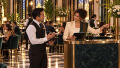 Scene 38 Sepsut and a waiter coordinate the busy dinner room thumbnail